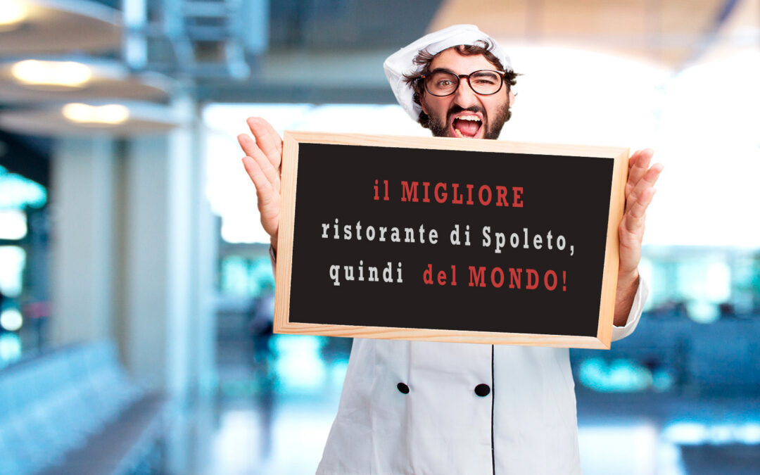 chef con in mano lavagna che fa pubblicità divertente al ristorante di Spoleto